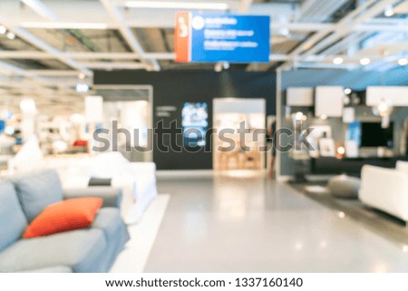 Abstract blur furniture decoration and warehouse store interior for background