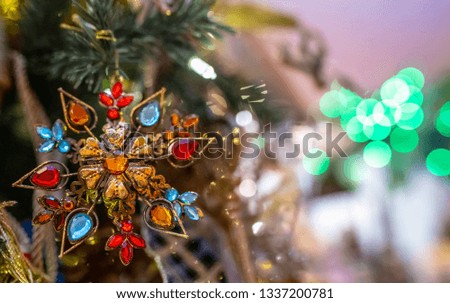 Blurred abstract dark background light with Christmas toys