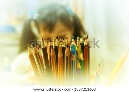 Drawing lessons. A lot of pencils in a glass. Picture taken in Ukraine, Kiev region. Horizontal frame. Color image. Soft focus