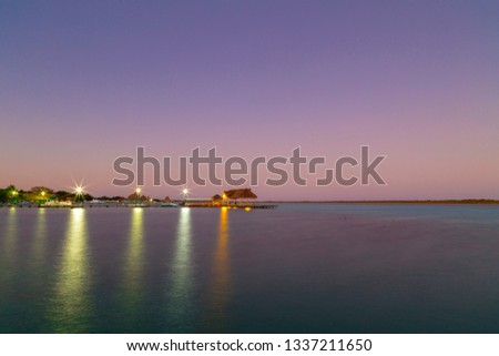 Night photography of the lagoon of the seven colors, in Bacalar, Quintana Roo, Mexico.