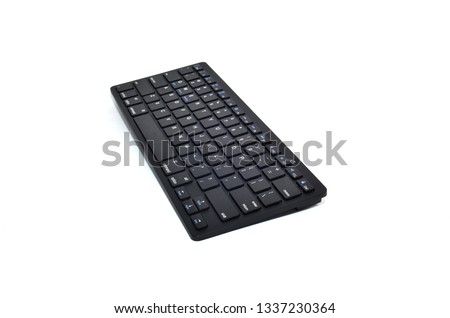 slim thin black keyboard with a plain white background
