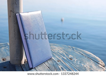 Book and sea