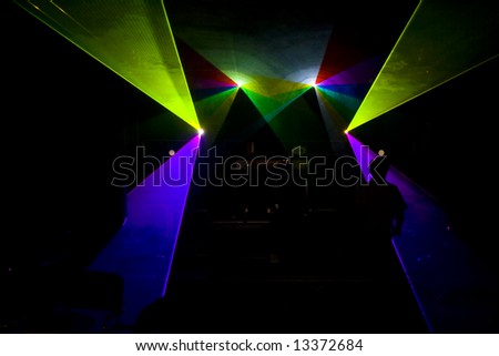 Colourful disco lighting is bright the stage