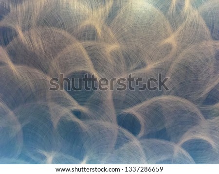 Background and texture of scratched lines stainless steel blue color wallpaper.