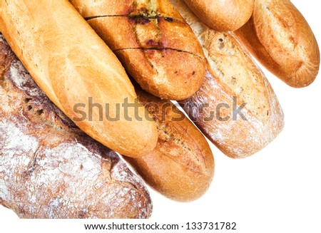 fresh baked loaves of bread isolated on white background