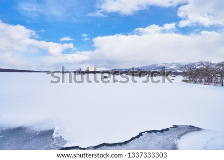 Beautiful landscape scenic of snow cover Onuma lake in Kameda district, Hokkaido, Japan.