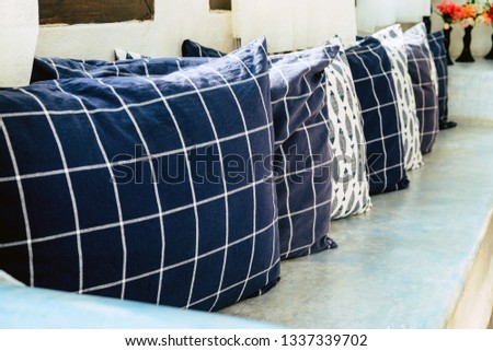 Image of blue pattern pillows in living room