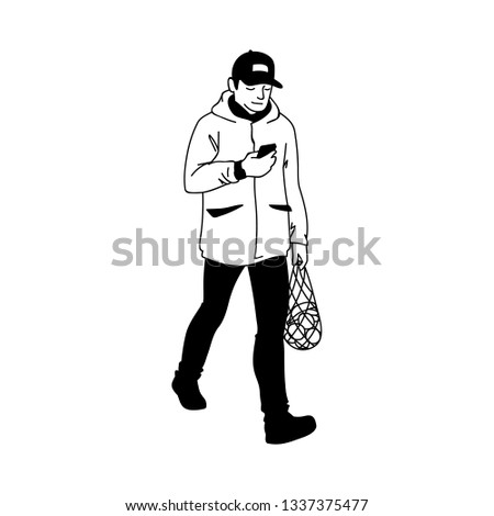 Adult man in warm jacket and baseball cap walking, looking at his smartphone. Monochrome vector illustration of man returns from supermarket with a package of fruit in simple line art style on white.