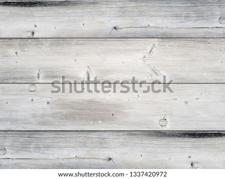 White washed wood background.
