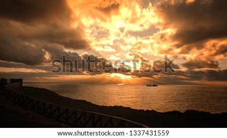 SUNSET, SEA AND CLOUDS Royalty-Free Stock Photo #1337431559
