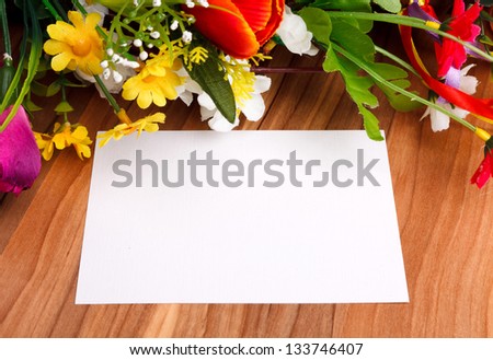 gift card with artificial flowers