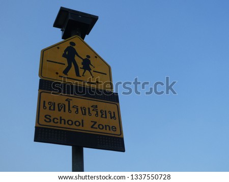 School Zone Sign Pole with clear sky background in Bangkok, Thailand