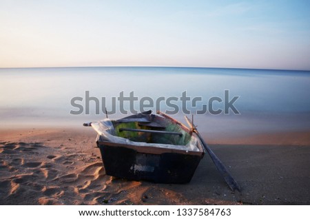 open sea and shore ship Royalty-Free Stock Photo #1337584763