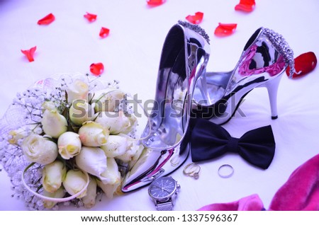 wedding shoes with wedding bouquet