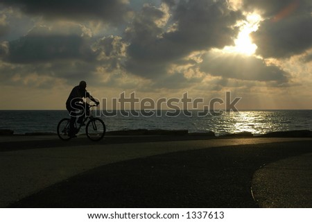 Bike at sunset by the beach