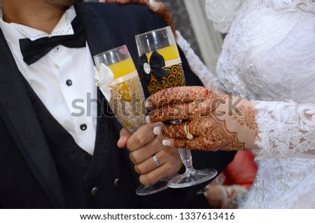 wedding theme, man and woman holding hands with beautiful ring