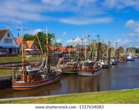 The harbor of Greetsiel/Germany Royalty-Free Stock Photo #1337634083