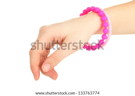 Colorful fashion bracelets on woman hand isolated on white
