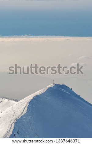 View from Mount Moléson to the snow-covered Swiss Alps