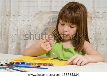 Young girl painting