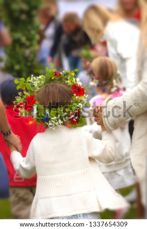 Girl with midsummer wreath.