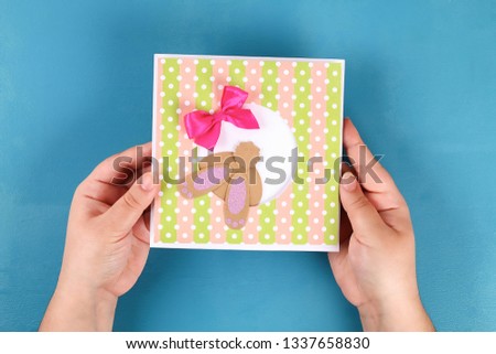 Diy Easter cards from paper. Volume greeting cards with a bunny, egg on blue background. 3d. Gift idea, decor Spring, Easter. Step by step. Top view. Process kid children craft.