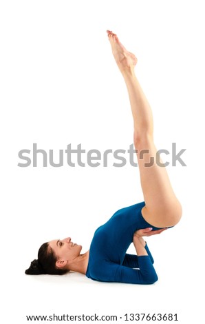 Beautiful slim girl in a blue bodysuit yoga trainer does assans. Isolated on white background