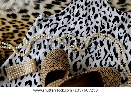 Layered color and black and white leopard print clothing 