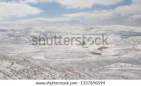 Snowfield and Valley from Jordan Royalty-Free Stock Photo #1337690594