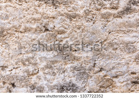 Wall rock texture of ancient building in Cyprus made from different stones
