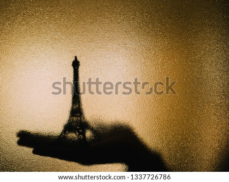 Shadow of the eiffel tower on a glass