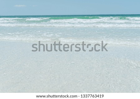 Paradise of Srichang beach,Thailand Asia.ocean wave at beach.Tropical beach for relax.Sea shore waves. Enjoy Soft wave of blue ocean on sandy beach,selective focus and white balance