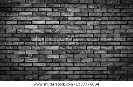 Dark Gray grunge Brick wall texture close up. Top view. Modern brick wall wallpaper design for web or graphic art projects. Abstract background for business cards and covers. Template or mock up.