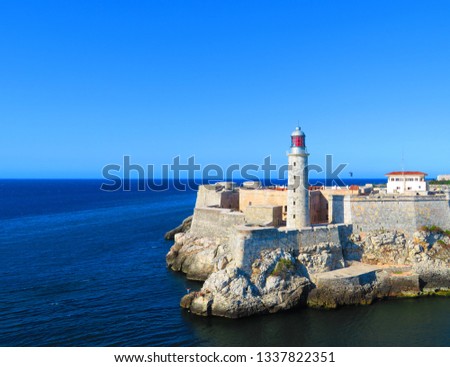 Fort Cabana light house in Havana, Cuba on a clear day view from the water.