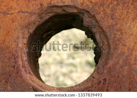 Rust hole erosion