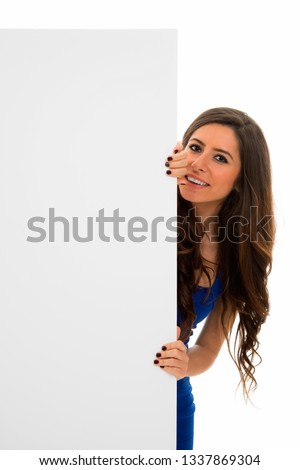 Young woman holding empty board