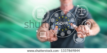 Man touching a gdpr concept on a touch screen with his fingers
