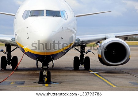 Boeing 737-800 parked on the airport apron, East Midlands Airport, Leicestershire, England, UK, Western Europe. Royalty-Free Stock Photo #133793786