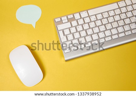 wireless keyboard on yellow background