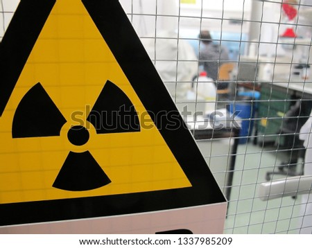 The radioactivity sign on the laboratory door               