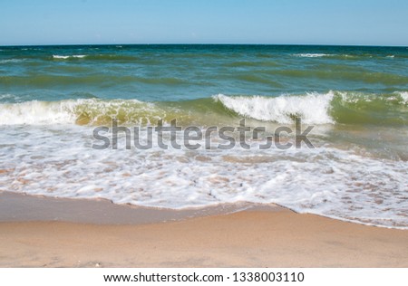 Beautiful seascape in sunny weather. The sea is stormy.