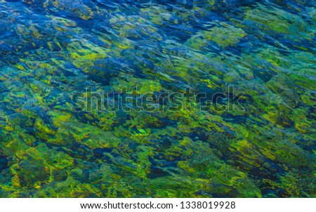 Beautiful green water ripples - shallow water texture