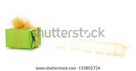 Present box with ribbon curl isolated on white