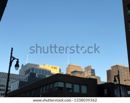 Sunlight only reaching the top of the buildings during winter season.