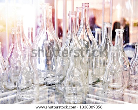 Empty bottles for alcoholic drinks at a shop window