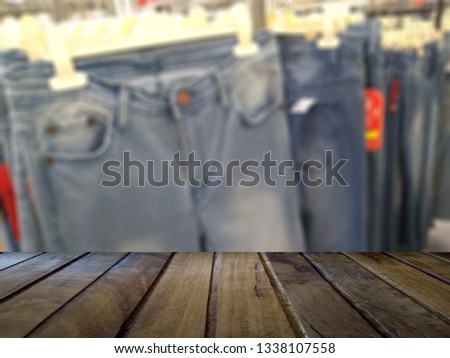 Texture wooden floor with clothes. Studio table room background. Good background for you to put text or other objects.