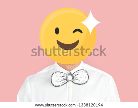 Winking face emoji portrait on a man