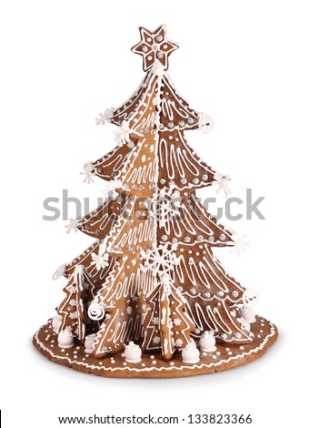 Baked Gingerbread Christmas tree decoration with sugar icing