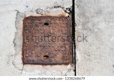 old rusty manhole