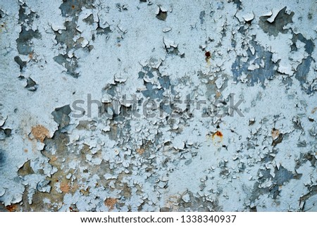 Rusty metal surface with gray paint corrosive, destruction, changes, metal corrosion, corrosive, flaking. Royalty-Free Stock Photo #1338340937